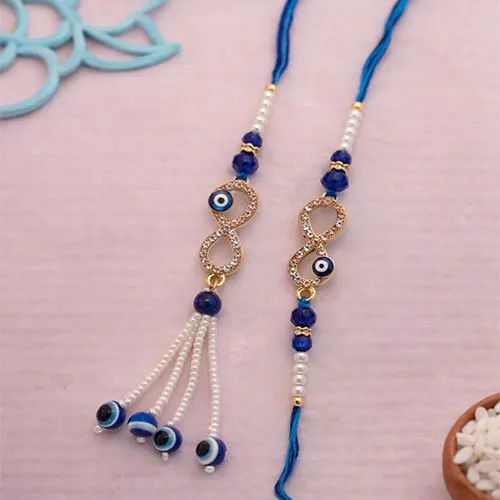 330553974_Nazar-Shield-Rakhi-Combo-For-Bhaiya-Bhabhi.webp