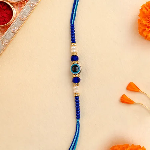 449661545_Stylish-Blue-Evil-Eye-Rakhi-Modern-Rakhi.webp
