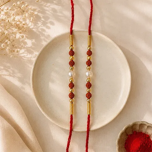 488583375_Rudraksha-Pearl-Rakhi-Pair-with-Golden-Beads.webp