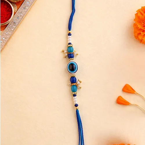 739769155_Stylish-Blue-Evil-Eye-Rakhi-Set–Modern-Rakhi.webp