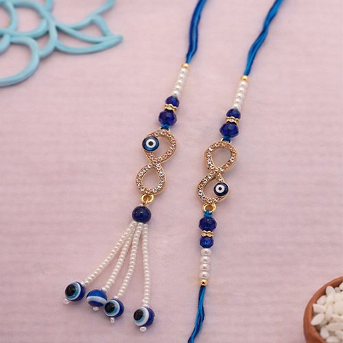 804290142_Cute-Evil-Eye-Rakhi-Set-for-Bhaiya-Bhabhi-zoom.jpg