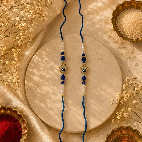 808445443_Luxury-Pearl-Evil-Eye-Rakhi-Pair.webp