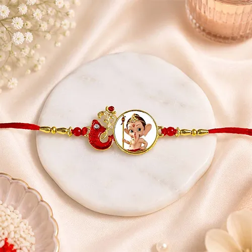 Designer Om Rakhi with Bal Ganesha Charm-Giftii